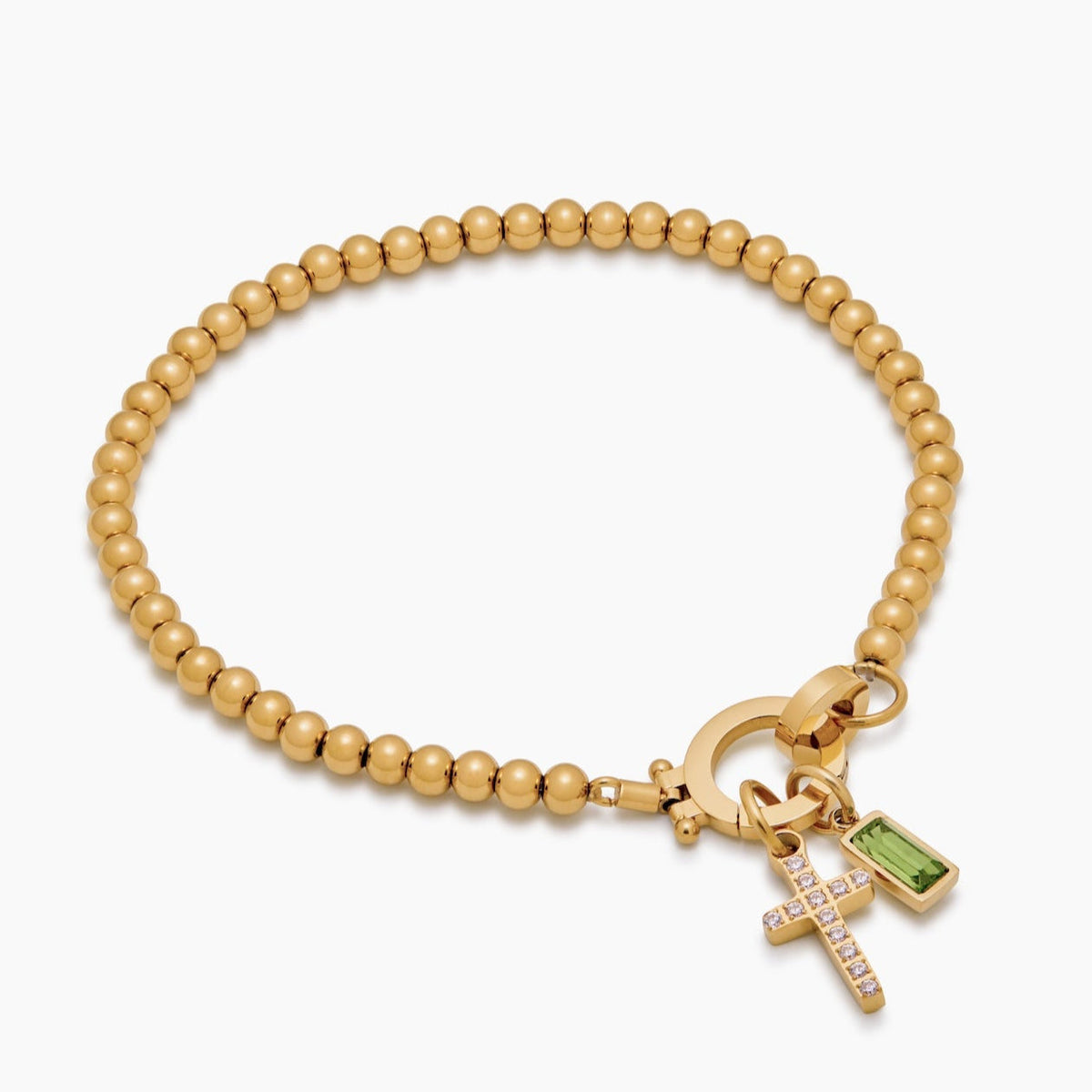 Pulsera con dije de cruz y piedra natal de cuentas