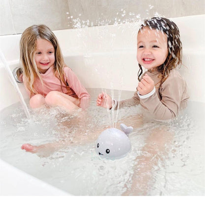 Juguete de baño de ballena feliz Toddla™