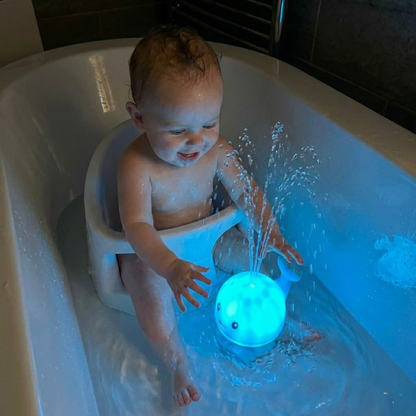 Juguete de baño de ballena feliz Toddla™