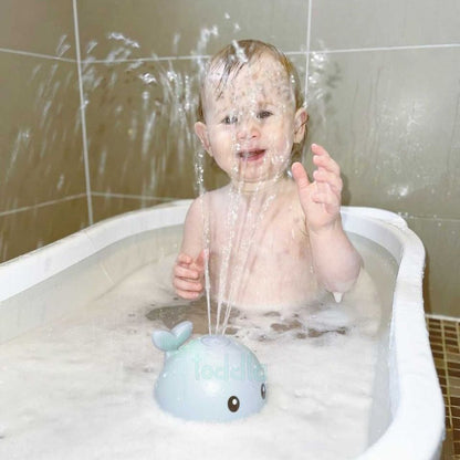Juguete de baño de ballena feliz Toddla™